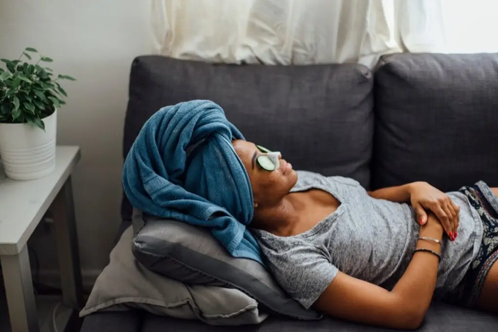 Person lying on couch